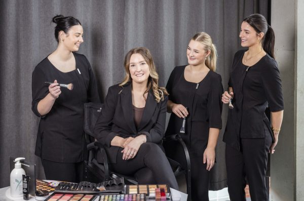 Beauty teacher Sarah Fiske with students